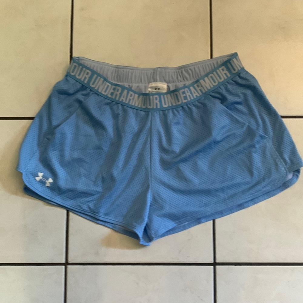Under Armour Women’s XL running shorts. Like new condition.